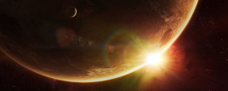 Planet with moon and sunrise