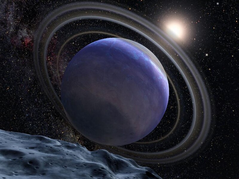 Planet with rings in space