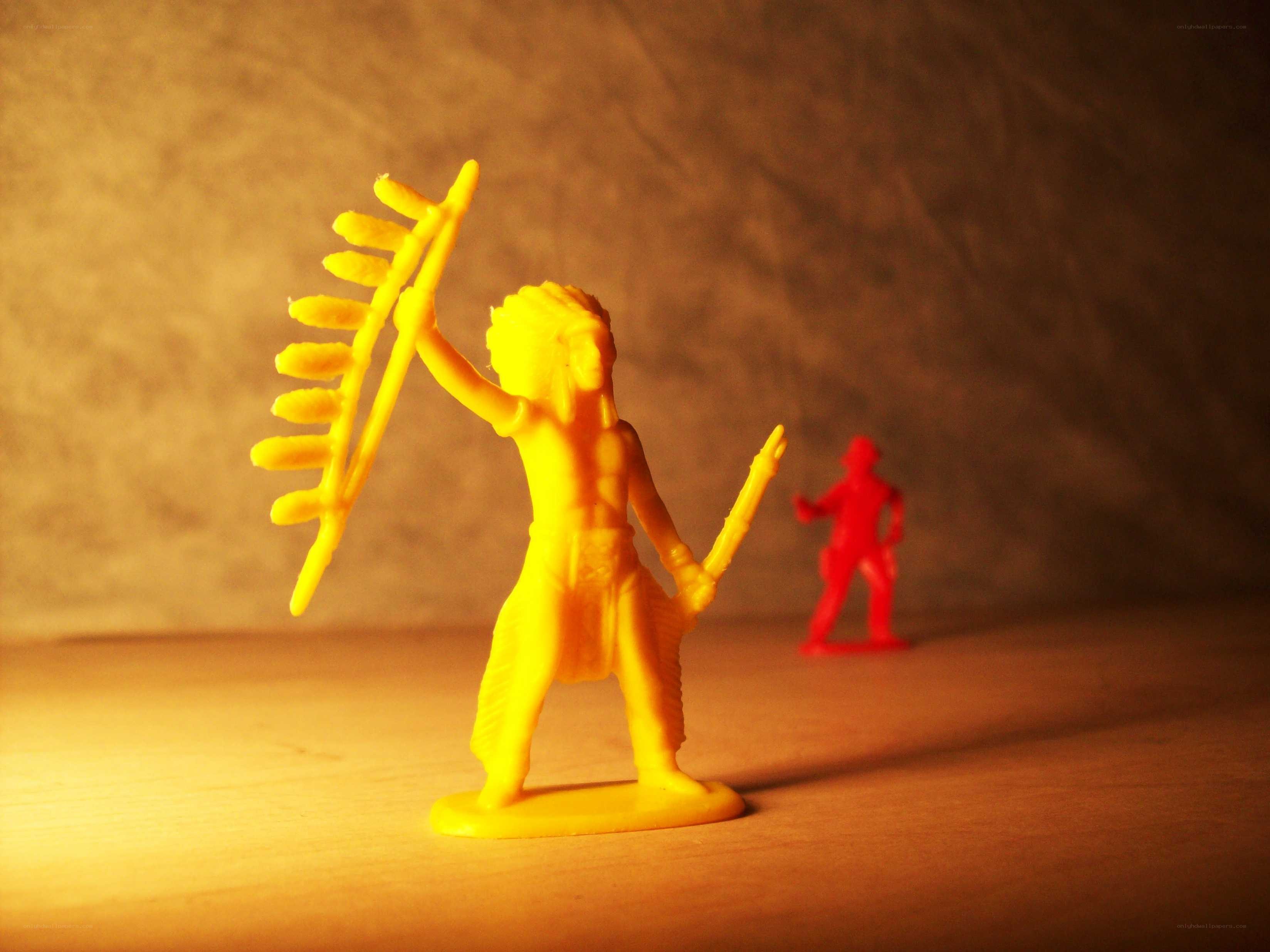Plastic toy soldiers in warm light