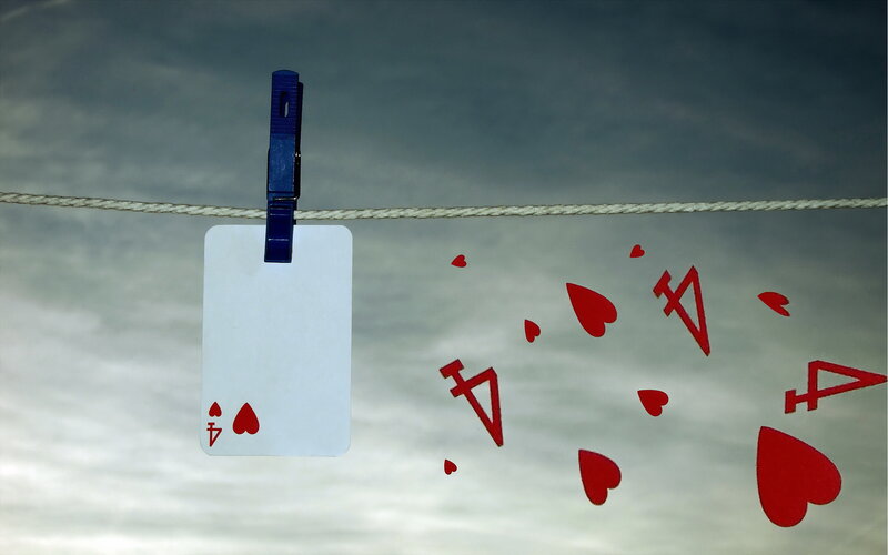 Playing Card on Clothesline