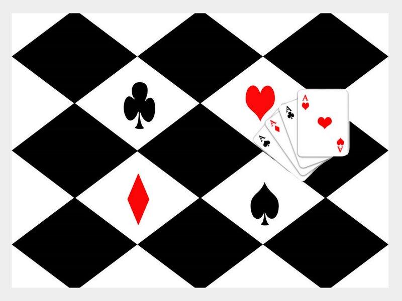 playing cards on checkered background