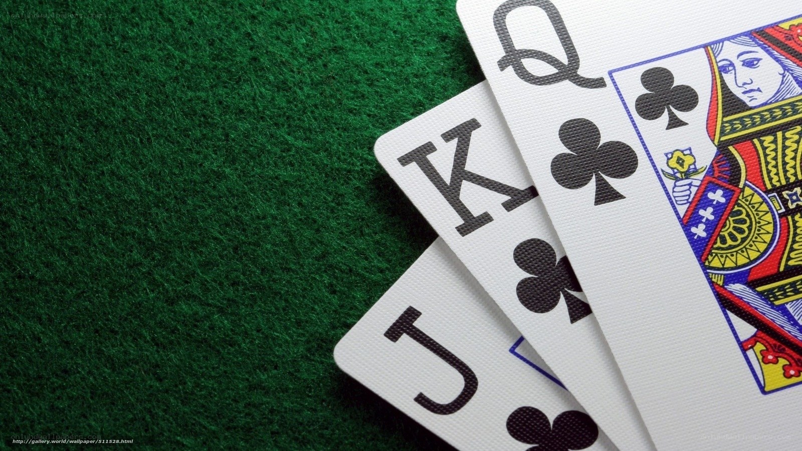 playing cards on green felt