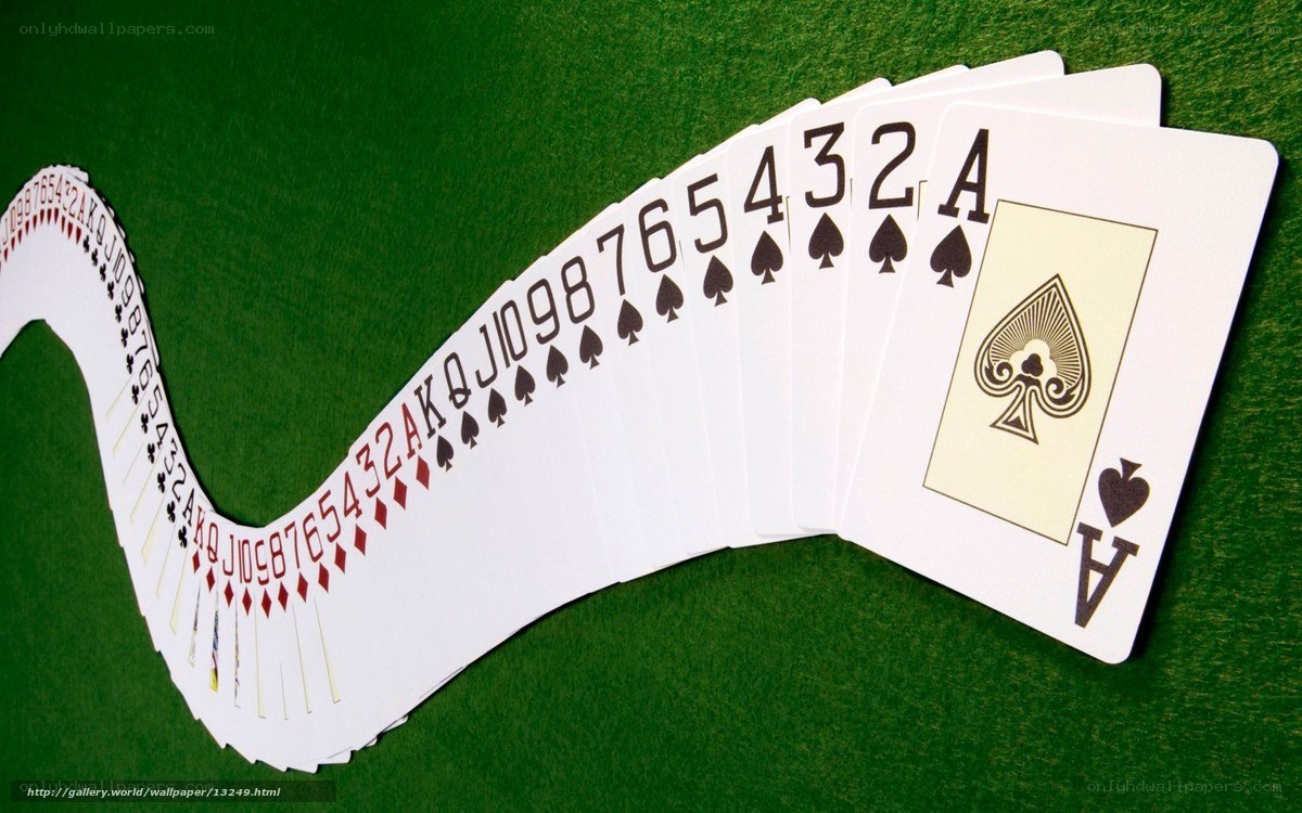 Playing cards on green felt