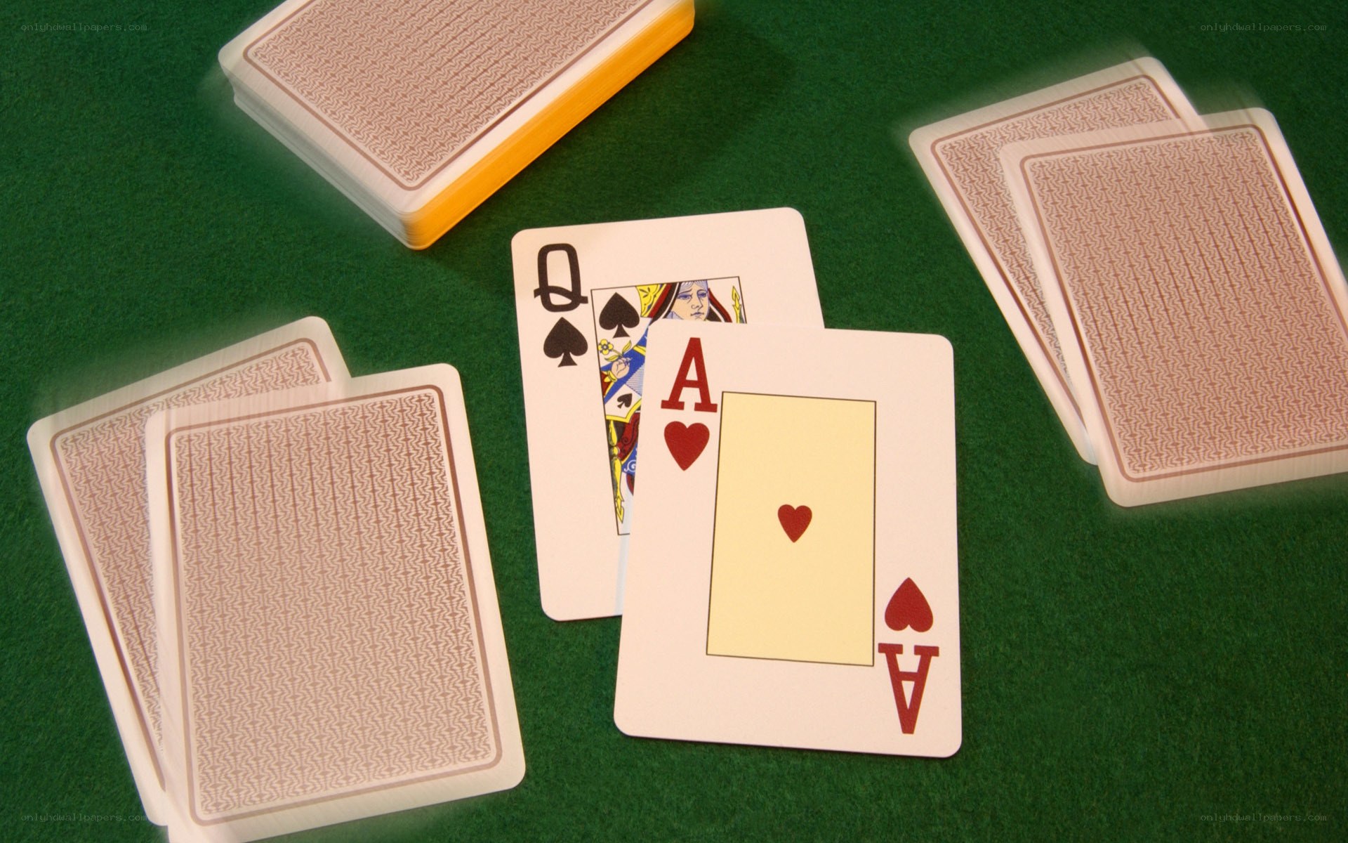 playing cards on green table