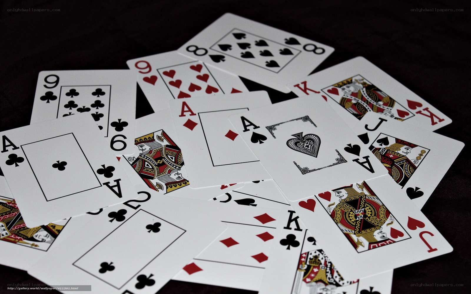 playing cards scattered on table