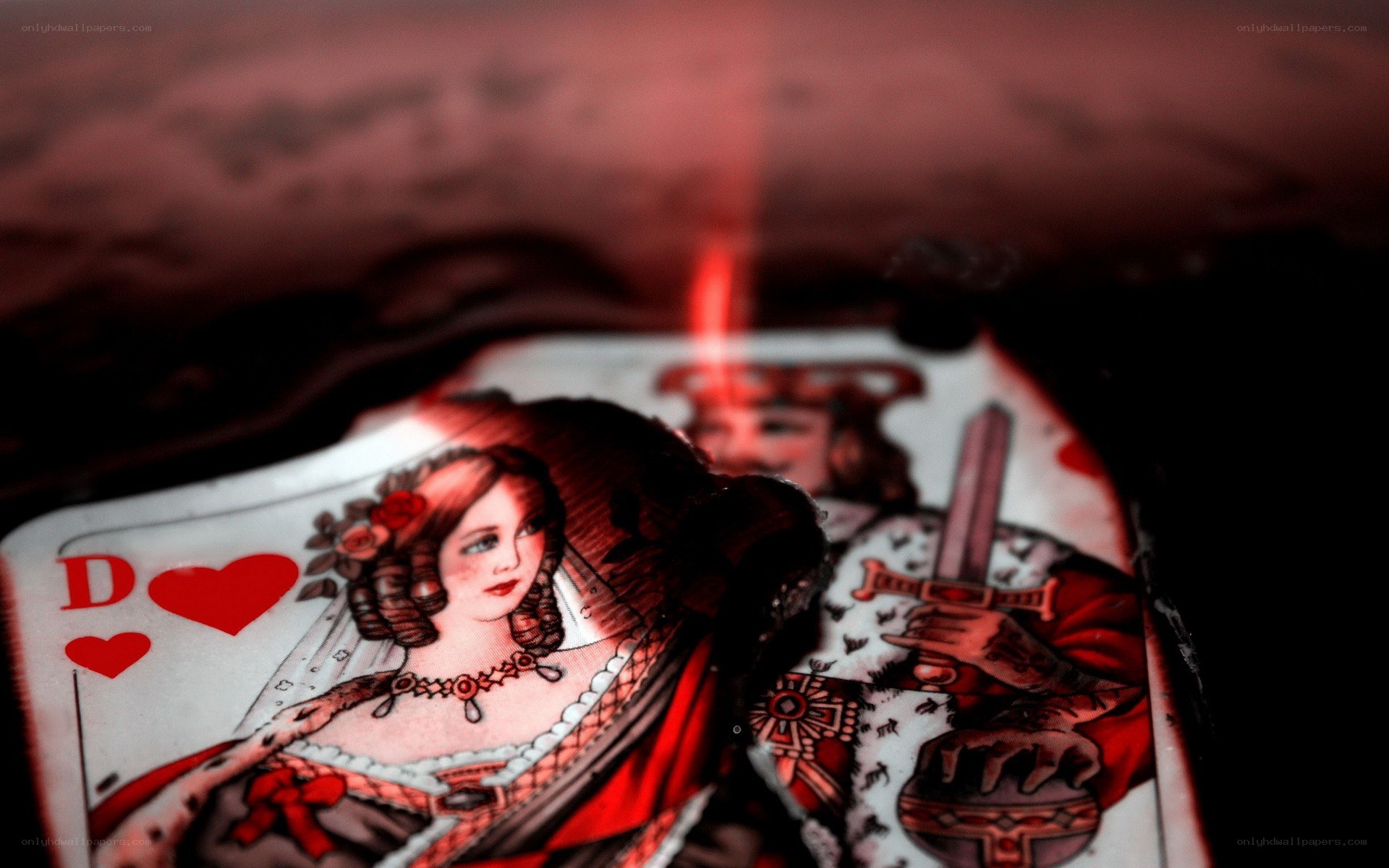 playing cards with red lighting