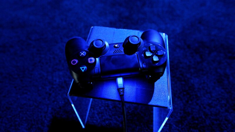 PlayStation controller on stand