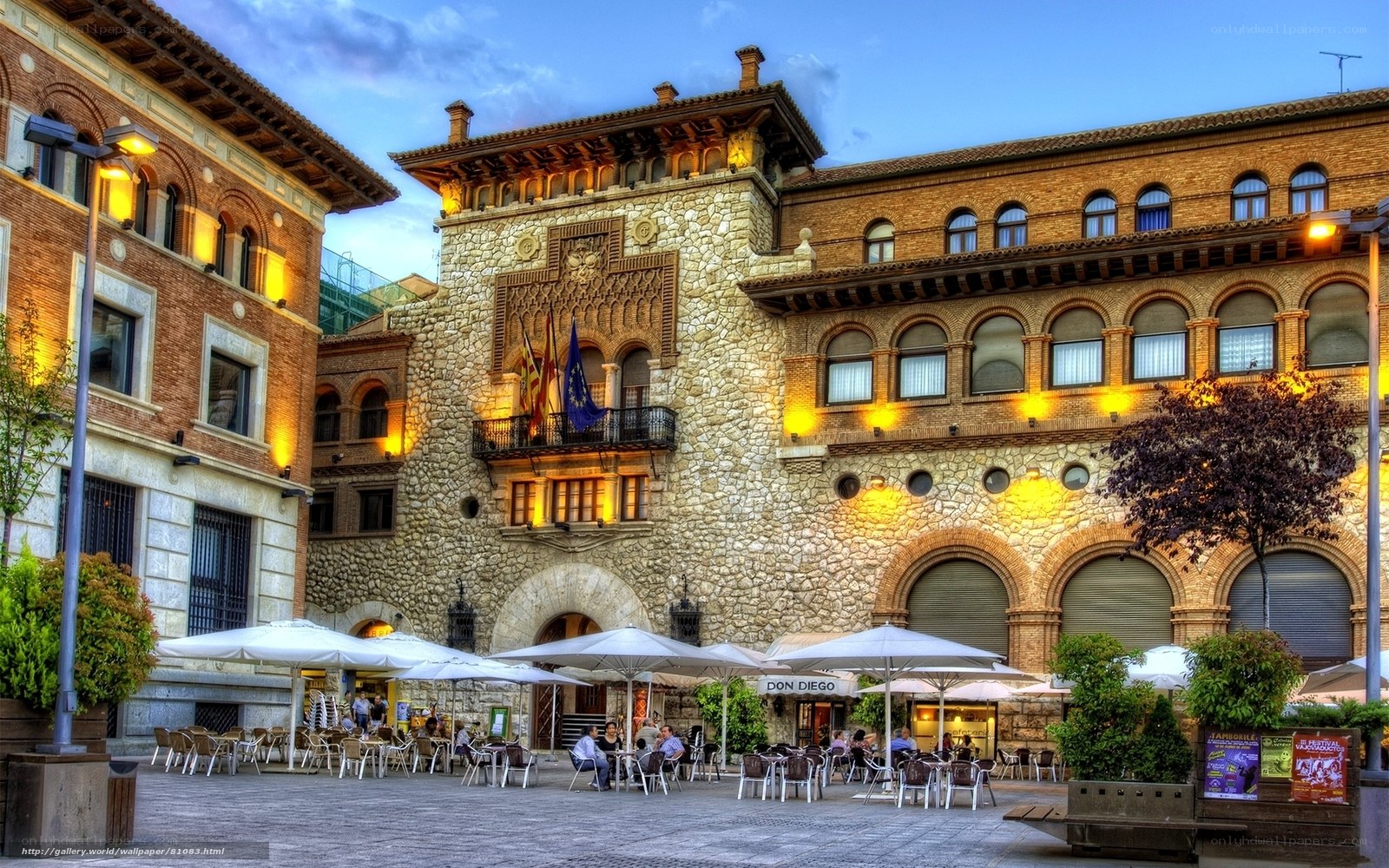 Plaza with historic building and cafe