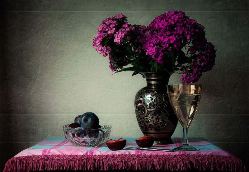 Plum and Flowers on Table