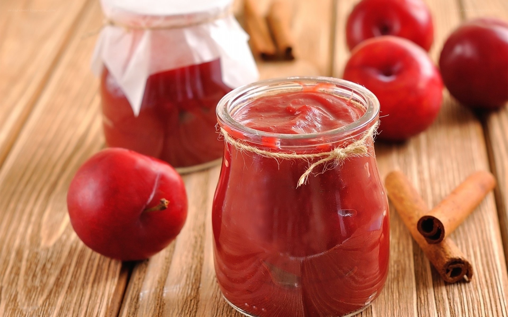 Plum jam in glass jars
