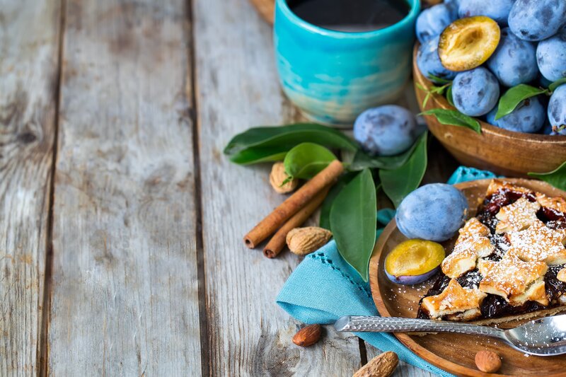 Plum Pie on Wooden Table