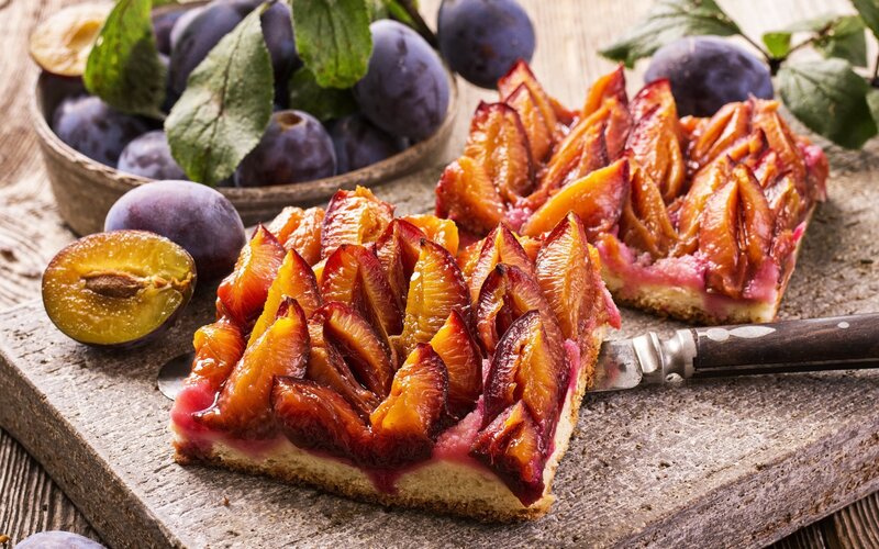 Plum Tart on Cutting Board