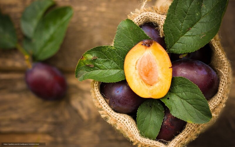 Plums in a burlap sack