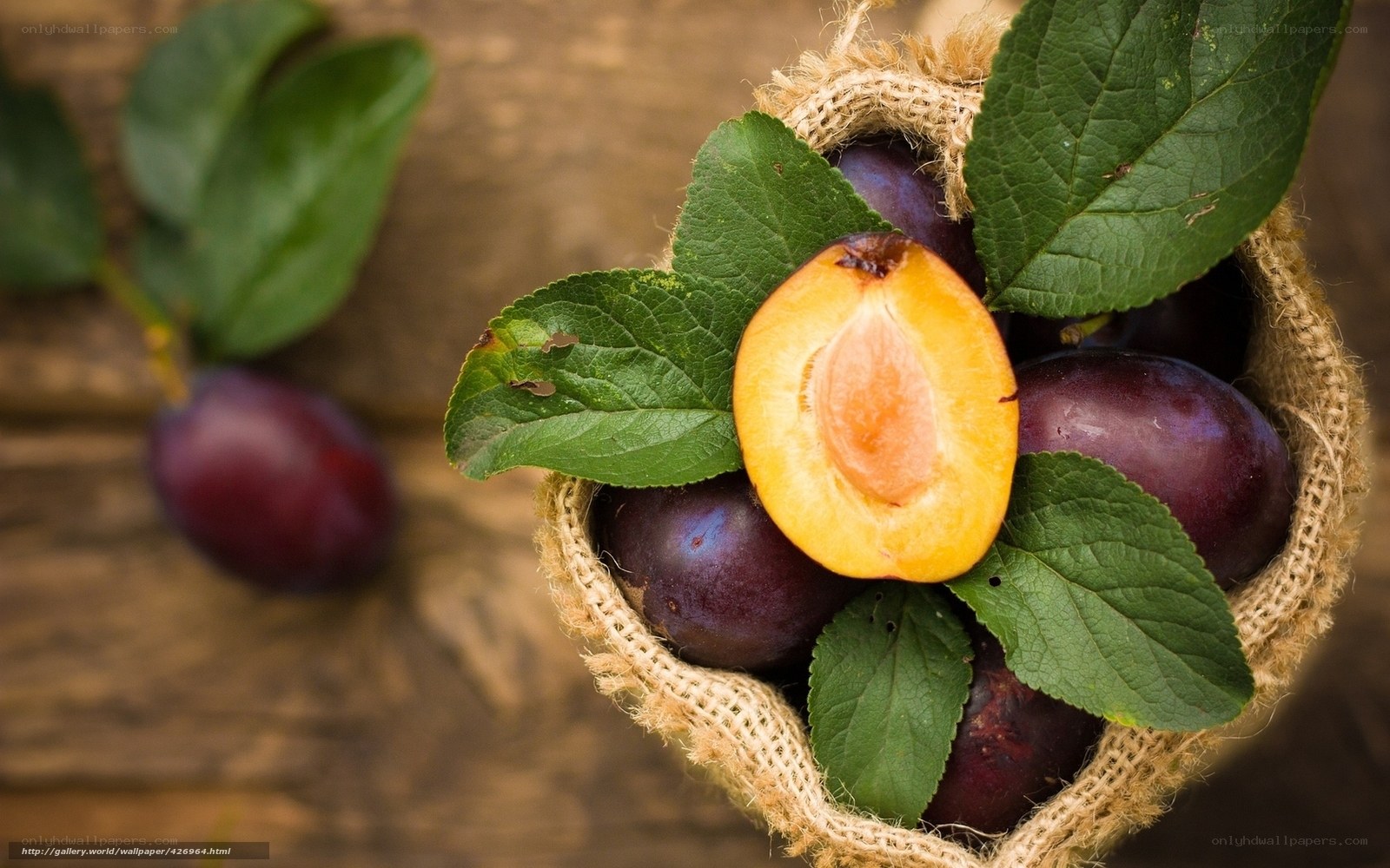 Plums in a burlap sack