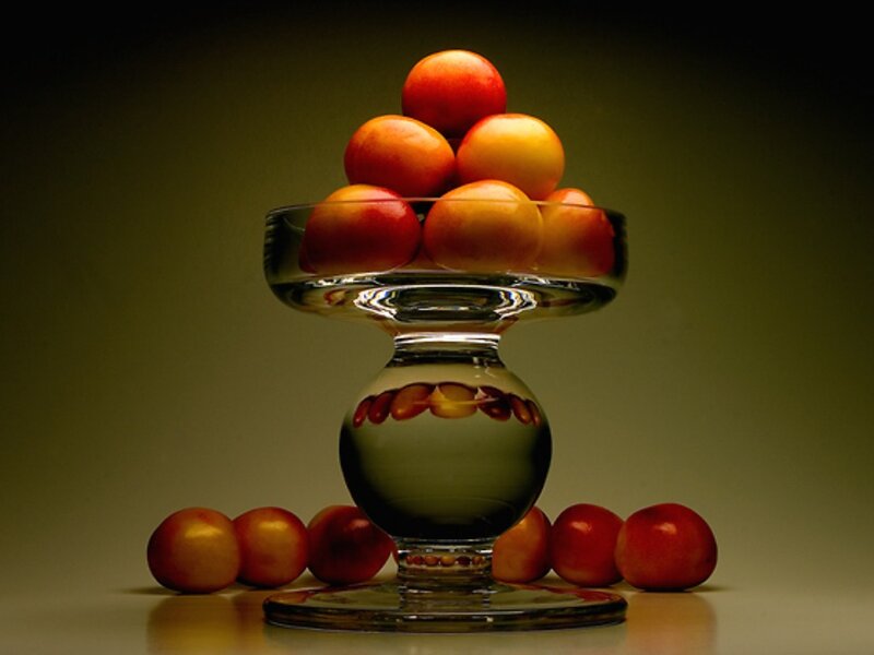 Plums in Glass Bowl