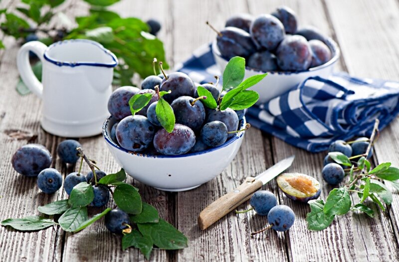 Plums in White Bowls