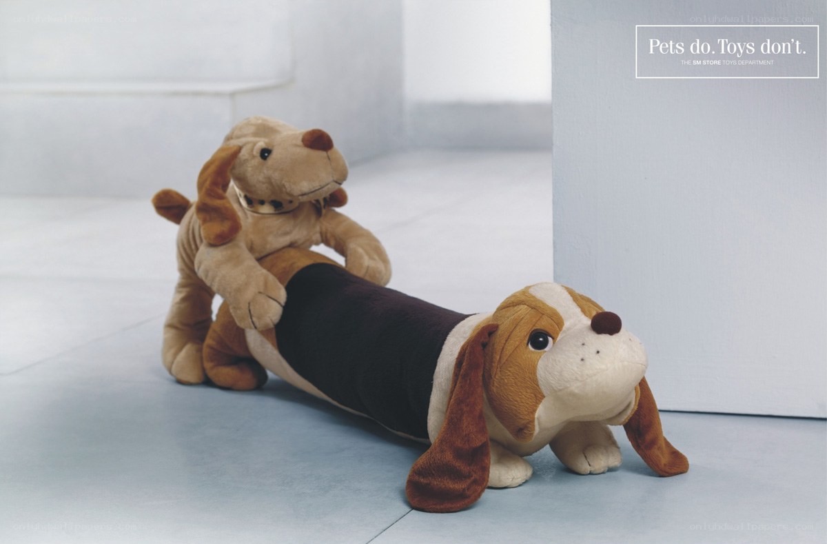 Plush dogs in a suggestive pose