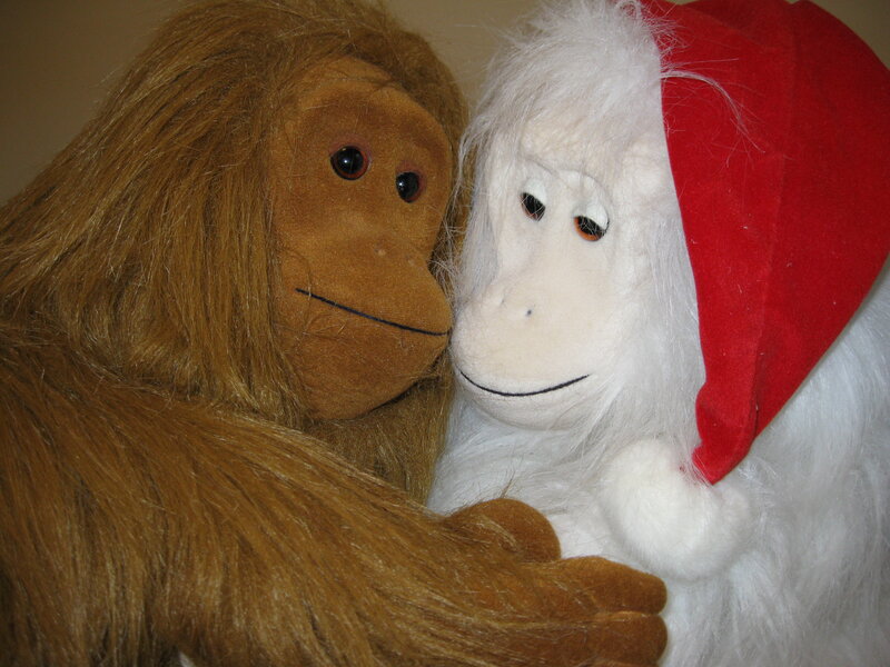 Plush monkeys hugging