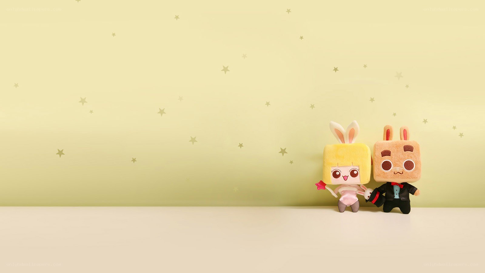Plush toys on a starry background