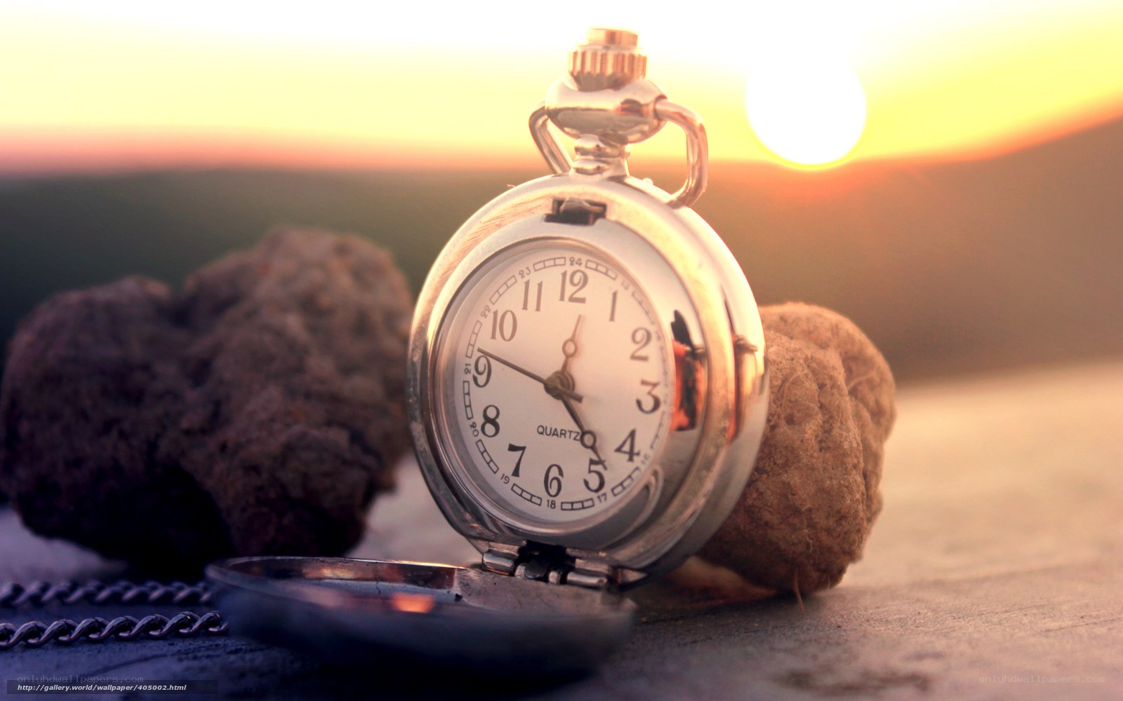 Pocket watch at sunset