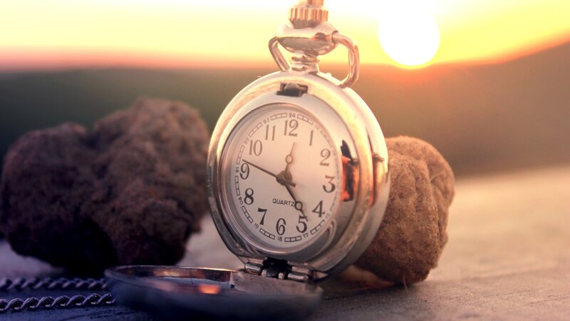 Pocket watch at sunset