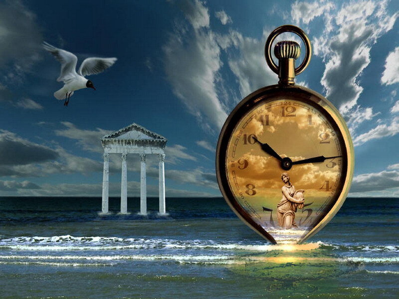 Pocket watch on a beach