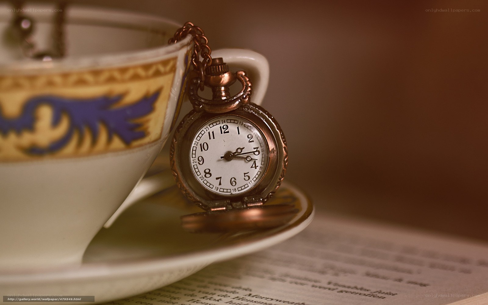 Pocket watch on a teacup