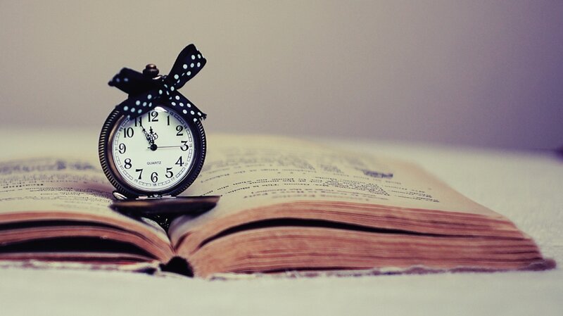 Pocket Watch on Book — White