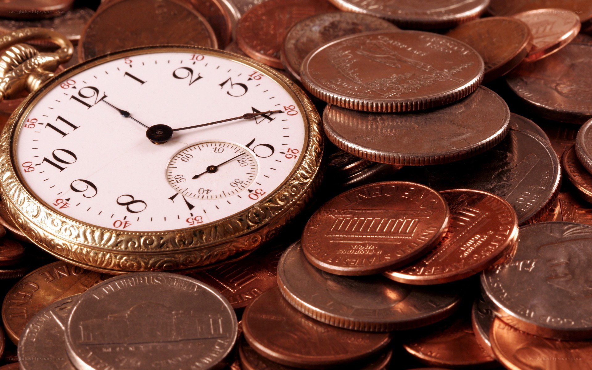pocket watch on coins