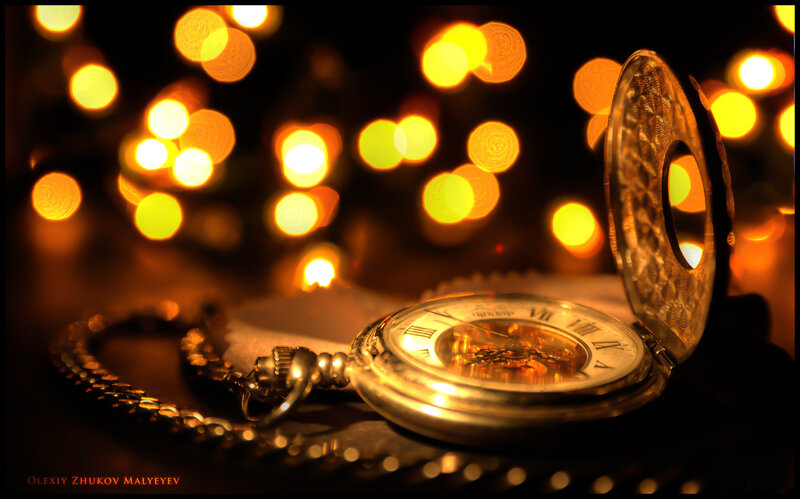 Pocket watch with bokeh lights