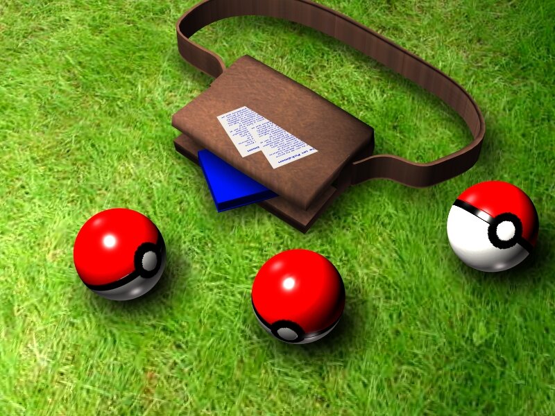 Pokémon balls and Pokédex on grass