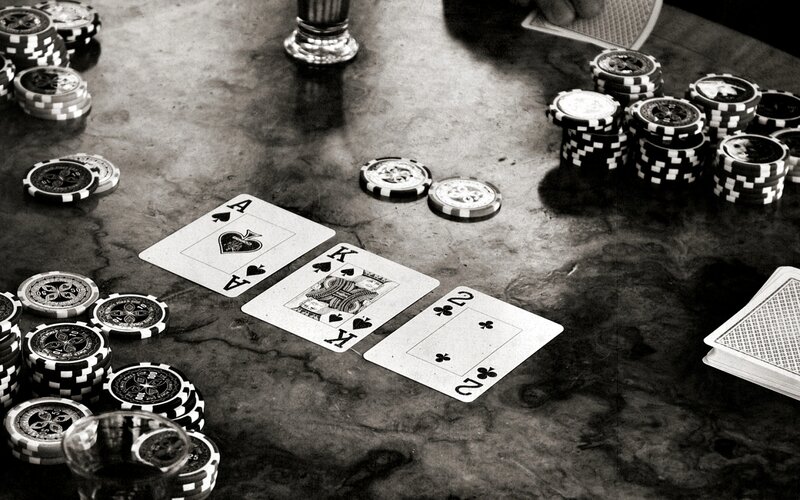 Poker Cards and Chips — Black, Tense