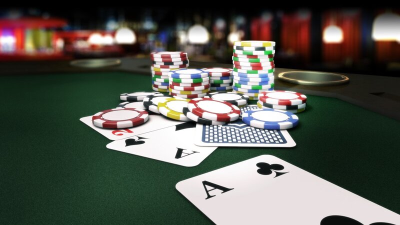Poker cards and chips on table