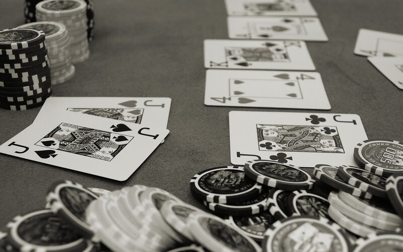 Poker cards and chips on table