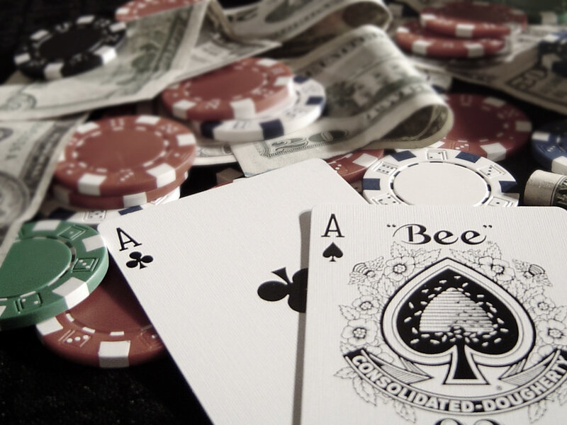 Poker cards and chips with money