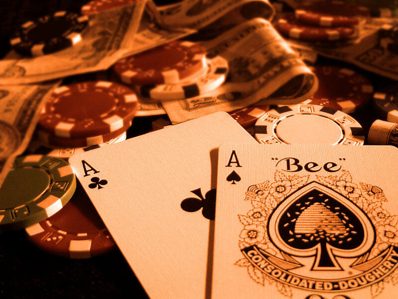 Poker cards and chips with money