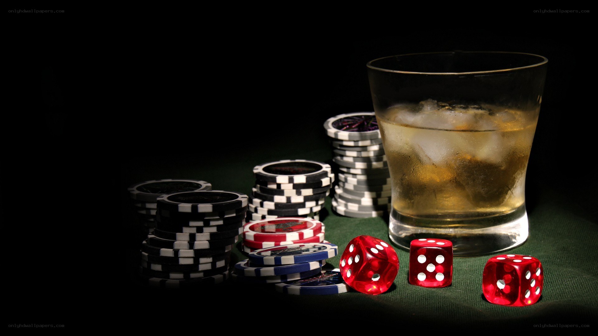 Poker chips and whiskey glass