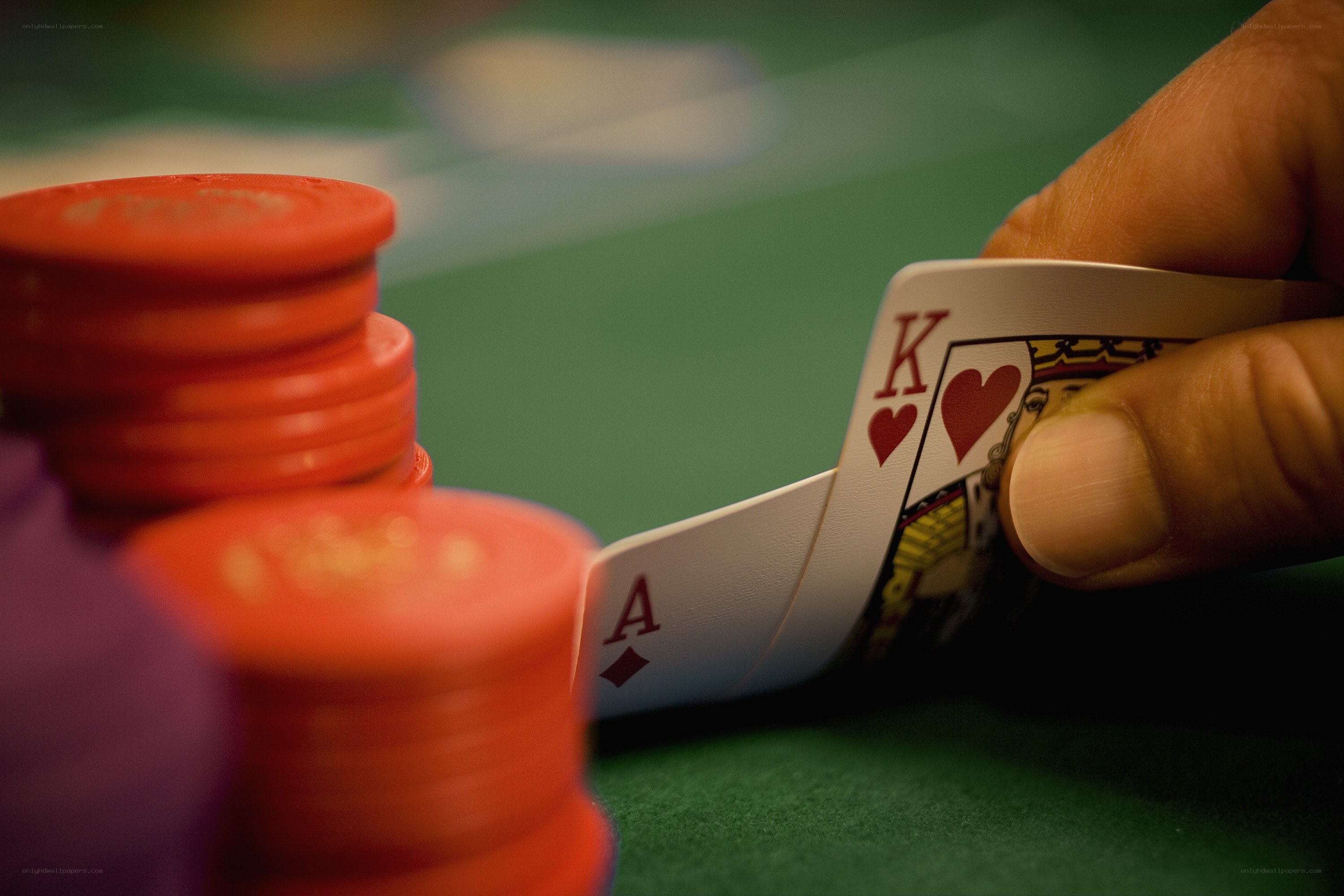 Poker hand with cards and chips