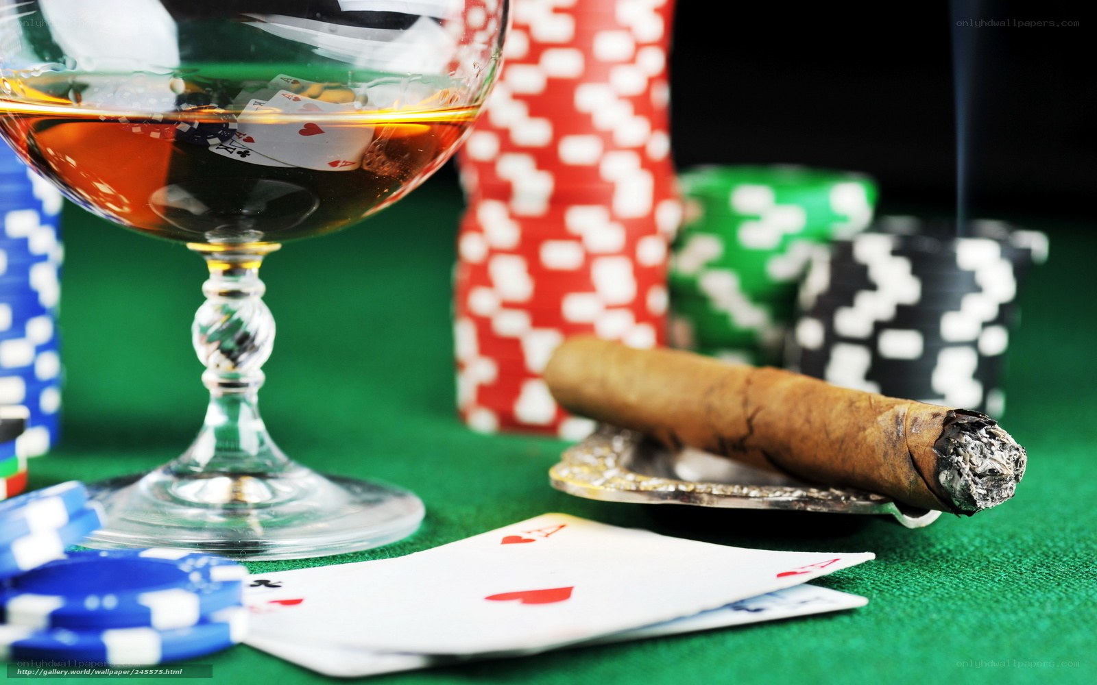 Poker night with cigar and drink