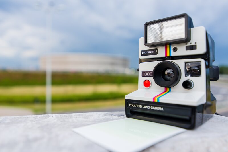 Polaroid camera on a ledge
