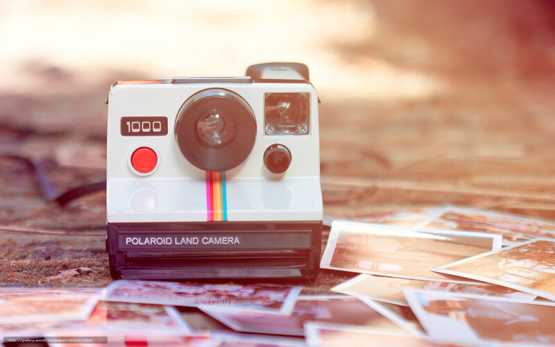 Polaroid camera with photos
