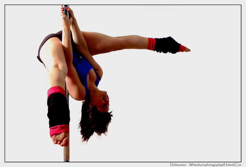 pole dancer in blue leotard