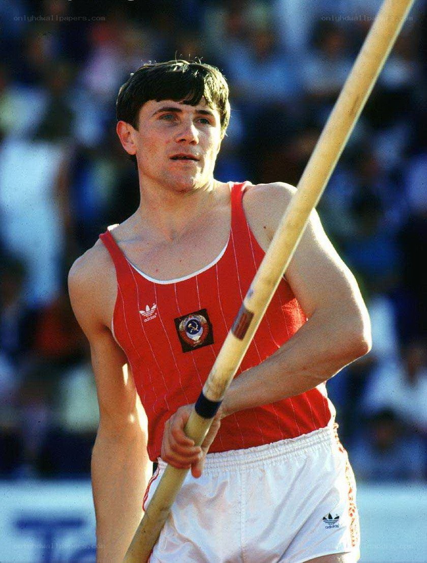Pole vaulter in red uniform
