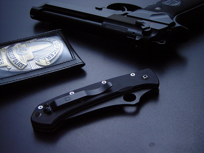 Police Badge and Weapons