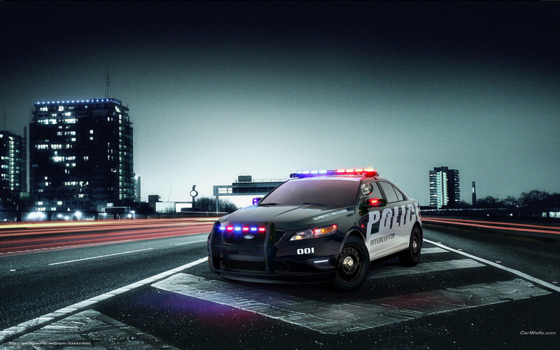 Police car at night in city