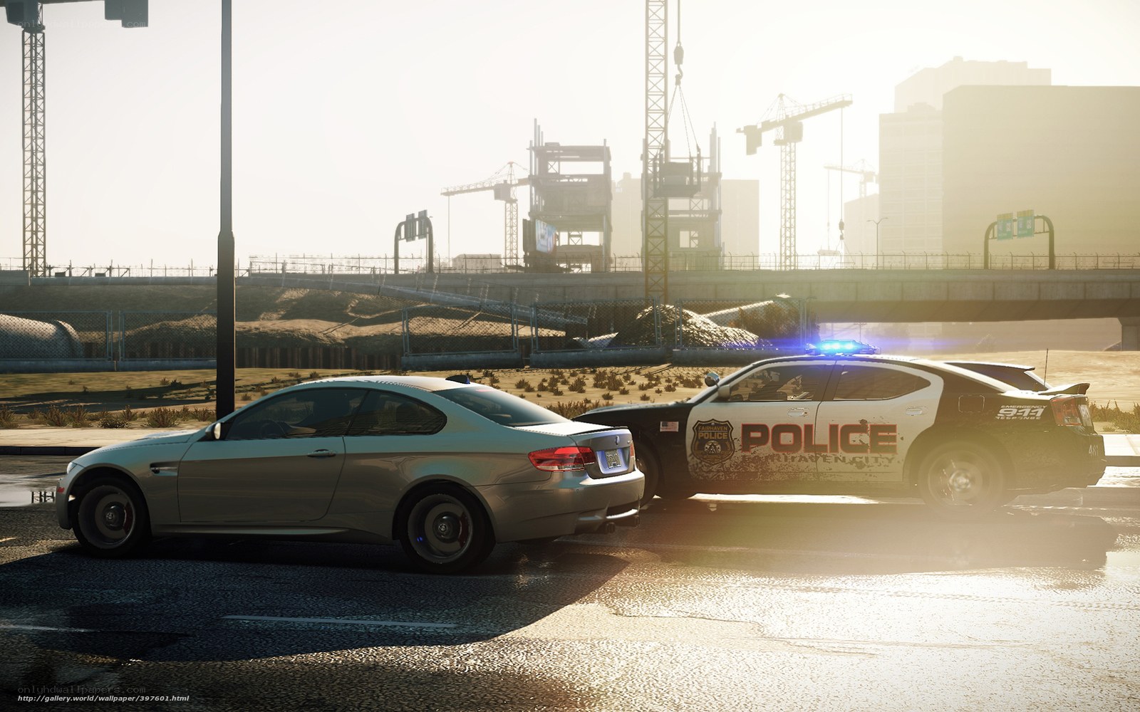 Police car chasing sports car