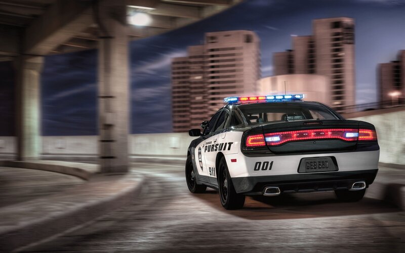 Police car in city at night