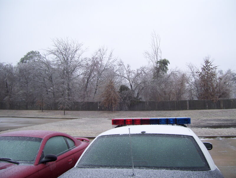 Police car in icy conditions