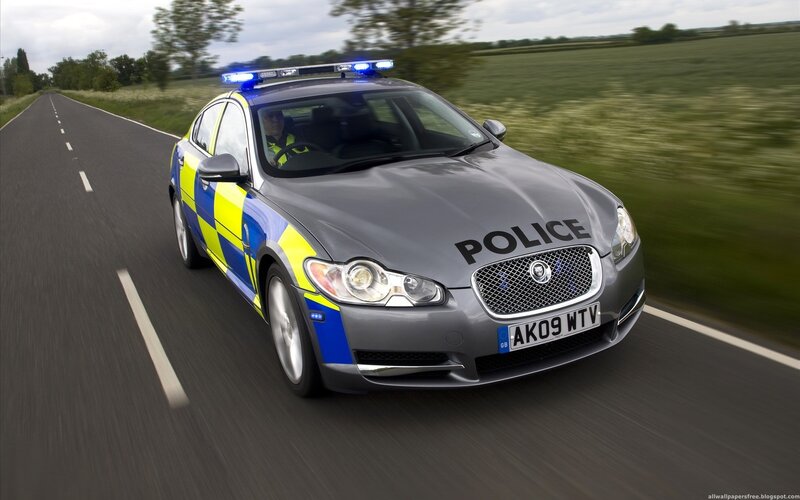 Police car on a country road