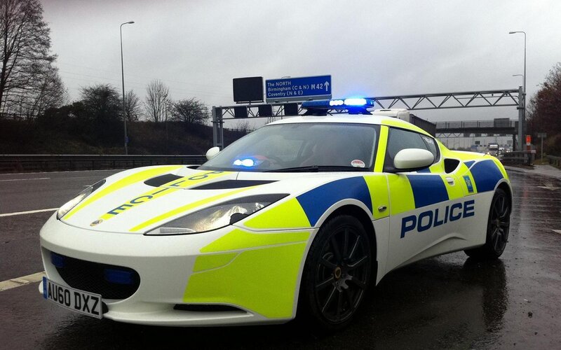 Police Car on Highway — White